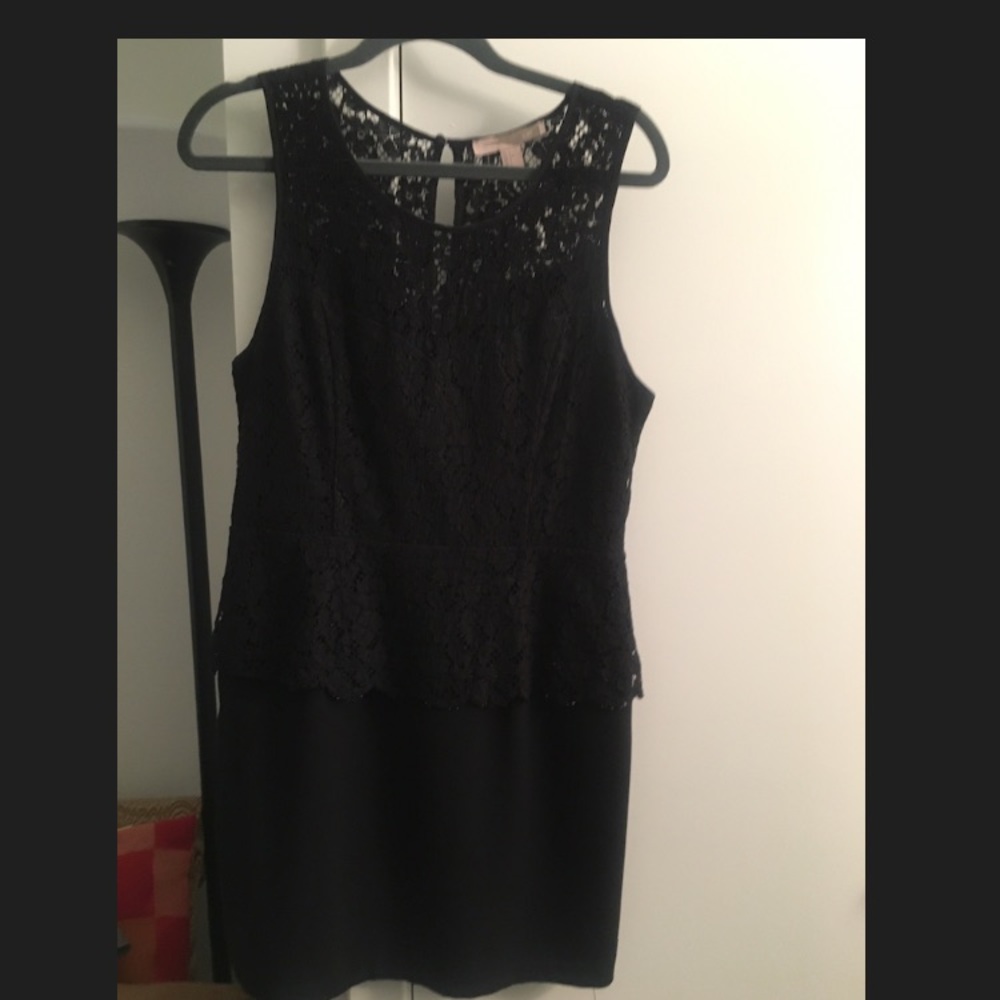 peplum dress with lace overlay. Size medium.